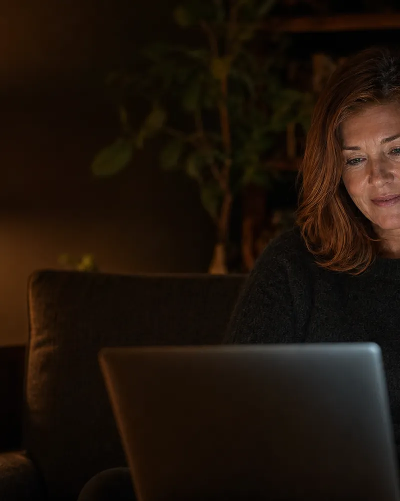 Woman having telehealth consultation from home