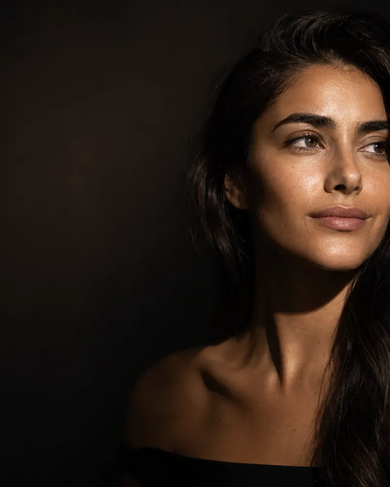 Person with healthy hair and clear skin